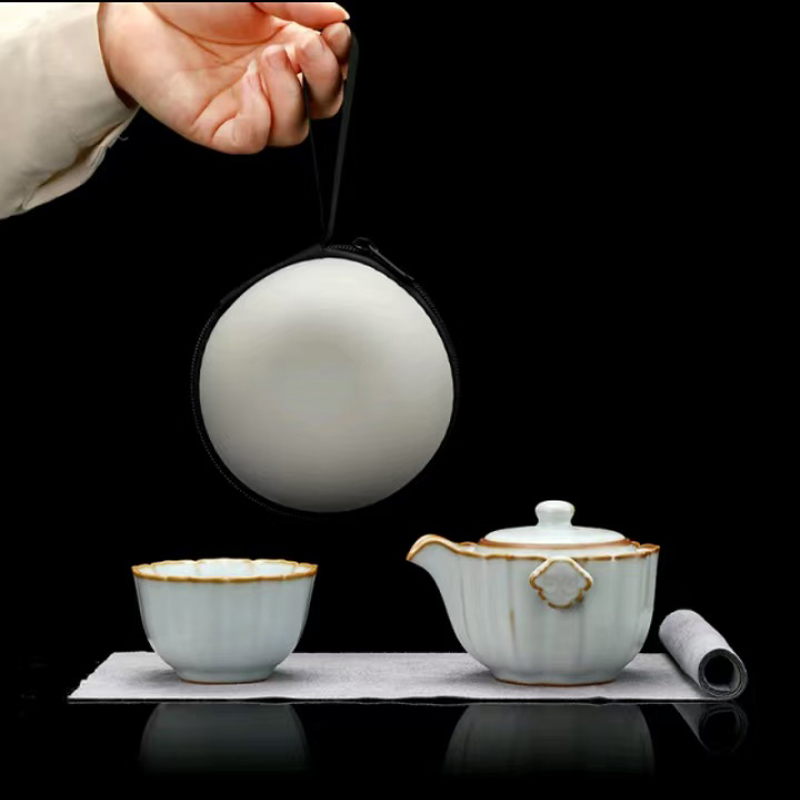 鹏翼亚黄汝窑浮雕快客杯